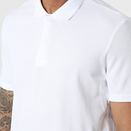 Calvin Klein - Polo a manica corta con strisce Elevated Logo 9558 Bianco
