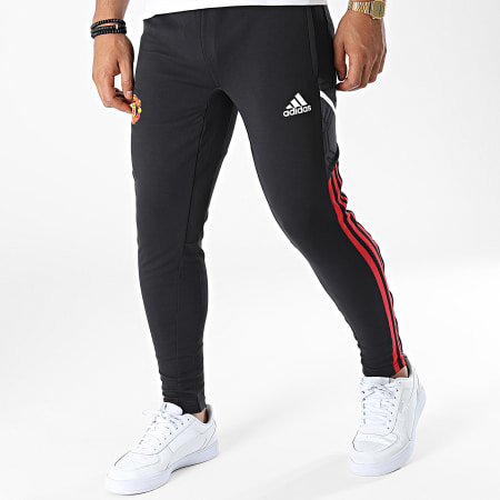 Adidas Sportswear - Pantalon Jogging A Bandes Manchester United FC HG3986 Noir