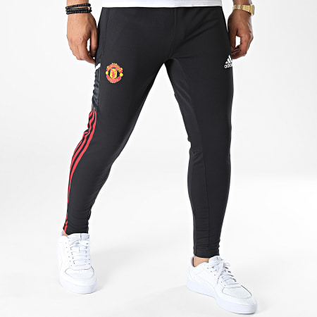Adidas Sportswear - Pantaloni da jogging con bande nere del Manchester United FC HG3986