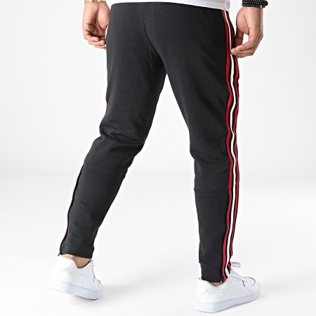 Adidas Sportswear - Pantaloni da jogging a fascia del Manchester United HU1184 Nero