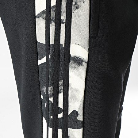 Adidas Originals - HK2808 Pantalón de chándal con banda de camuflaje Negro