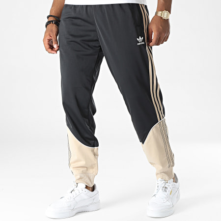 Adidas Originals - SST HI3004 Pantalón de chándal de punto a rayas negro beige