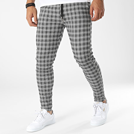 Pantalones de cuadros blanco y 2025 negro