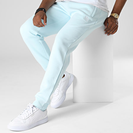 Adidas Originals - HK0108 Essentials Pantalones de chándal Azul claro