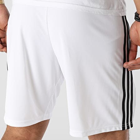 Adidas Sportswear - Pantaloncini da jogging a fascia del Manchester United H13888 Bianco