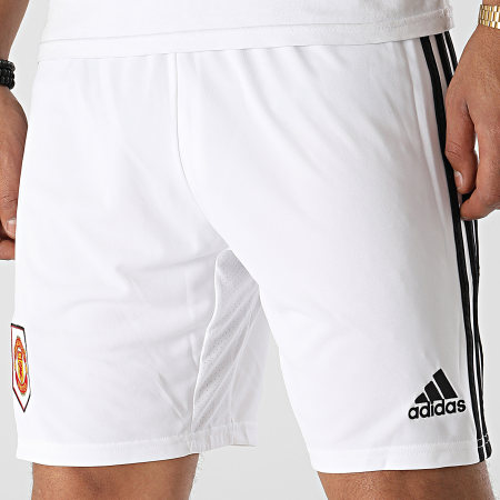 Adidas Sportswear - Pantaloncini da jogging a fascia del Manchester United H13888 Bianco