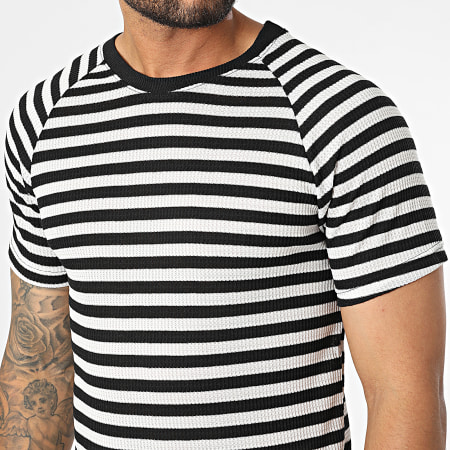 Camiseta rayada online blanca y negra