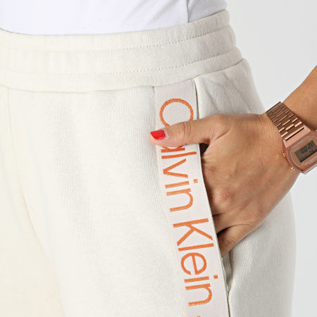 Calvin Klein - Pantalones de chándal de mujer con logotipo de cinta 9738 Beige