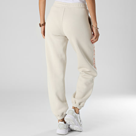 Calvin Klein - Pantalon Jogging Femme A Bandes Logo Tape 9738 Beige