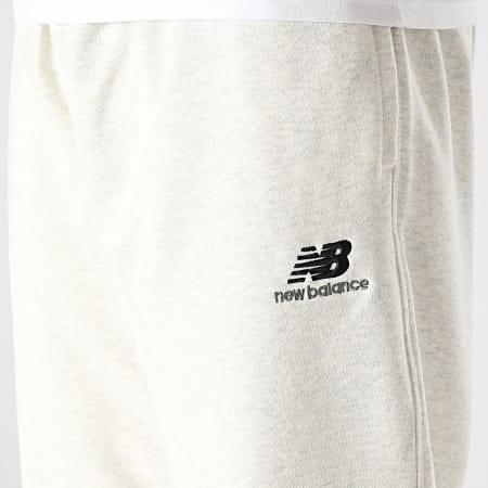 New Balance - Pantalones de chándal UP21500 Gris brezo