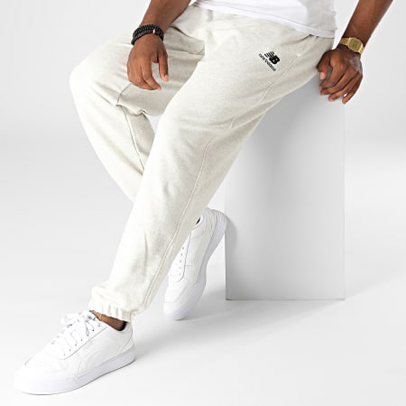 New Balance - Pantalones de chándal UP21500 Gris brezo