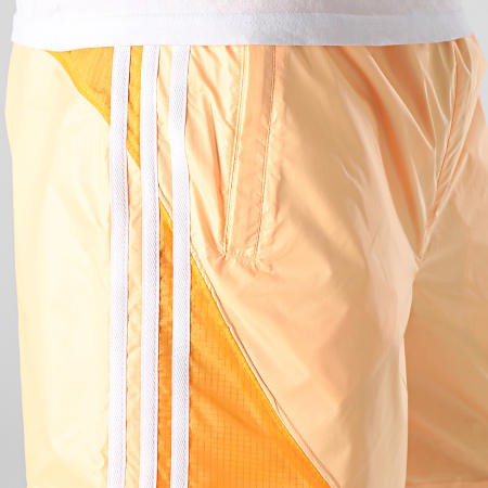 Adidas Originals - Pantaloncini da jogging estivi SST HC2098 con banda arancione