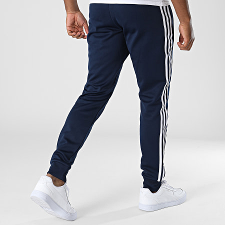 Adidas Originals - HK7353 Pantalón de chándal con banda azul marino