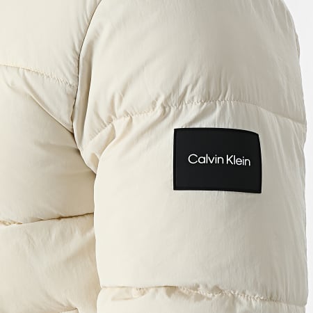 Calvin Klein - Puffer in nylon rugoso con cappuccio Piumino 0336 Beige