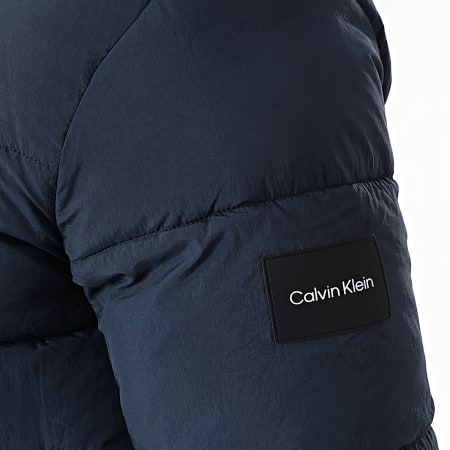 Calvin Klein - Puffer in nylon rugoso con cappuccio Piumino 0336 blu navy