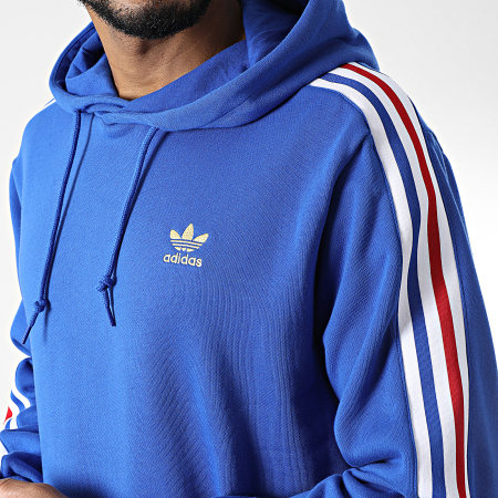 Adidas Originals - HK7394 Felpa con cappuccio a righe blu reale oro