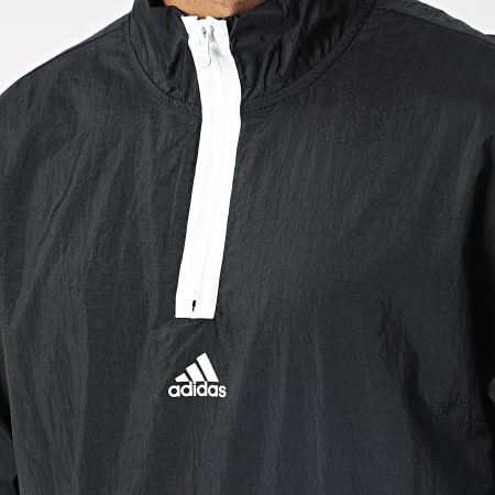 Adidas Sportswear - Giacca a vento con colletto a zip HJ9946 Nero