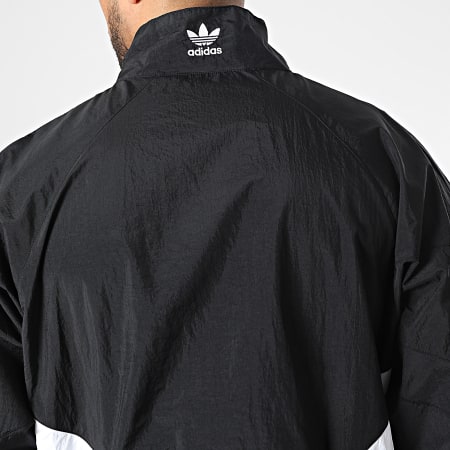 Adidas Originals - HK7322 Chaqueta negra a rayas con cremallera