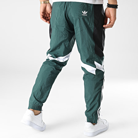 Adidas Originals - HK7324 Pantalón de chándal con banda verde