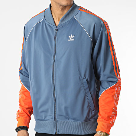 Adidas Originals - HI3003 Chaqueta con cremallera a rayas azul y naranja