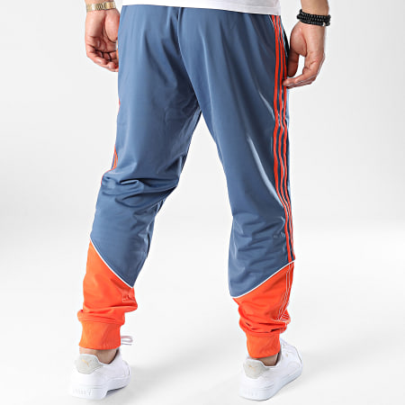 Adidas Originals - HI3007 Pantalón de chándal con banda azul y naranja