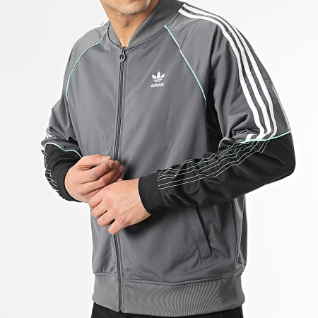 Adidas Originals - SST HI3002 Giacca con zip a righe in maglia grigia