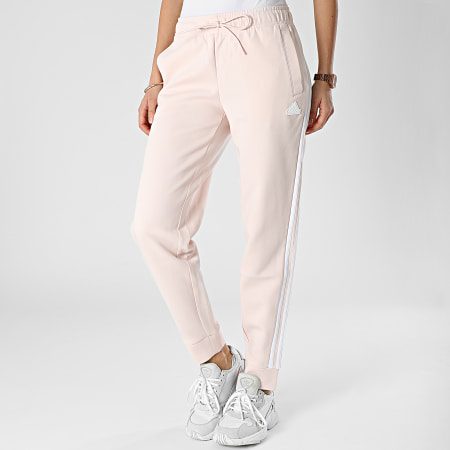 Adidas Sportswear - Pantaloni da jogging a fascia rosa pastello da donna IB8533