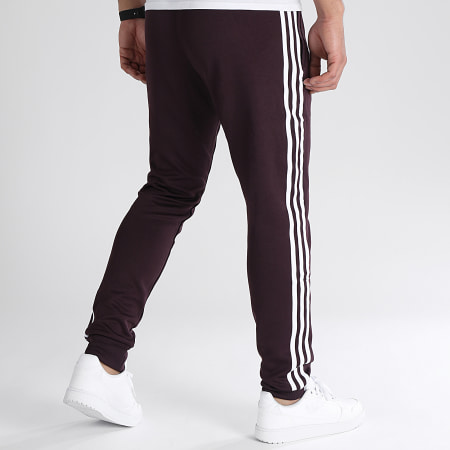 Adidas Originals - HK7352 Pantalones de chándal con banda Marrón