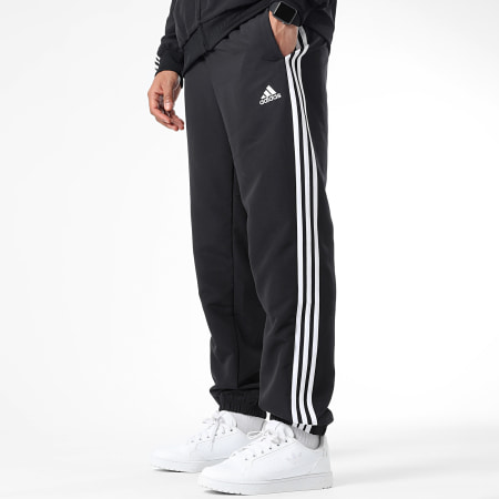 Adidas Sportswear - Tuta da ginnastica a 3 strisce IC6750 Nero