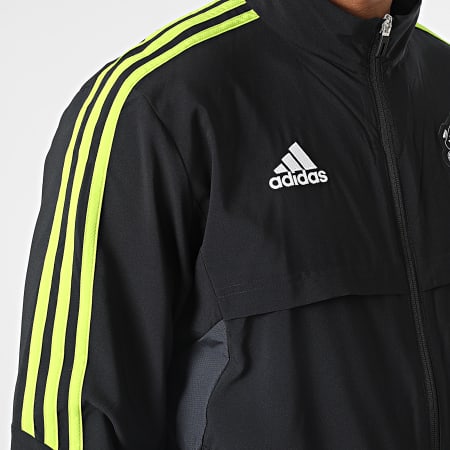 Adidas Sportswear - Giacca con zip a righe nere del Manchester United FC HE6680