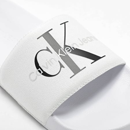 Calvin Klein - Claquettes Femme Monogram 0103 White