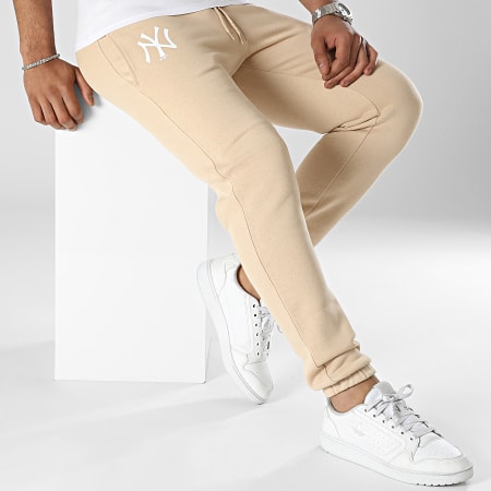 New Era - League Essentials Pantalones de chándal New York Yankees 60332156 Beige