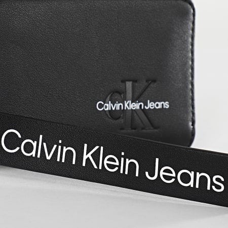 Calvin Klein - Billetero esculpido para mujer 0578 Negro