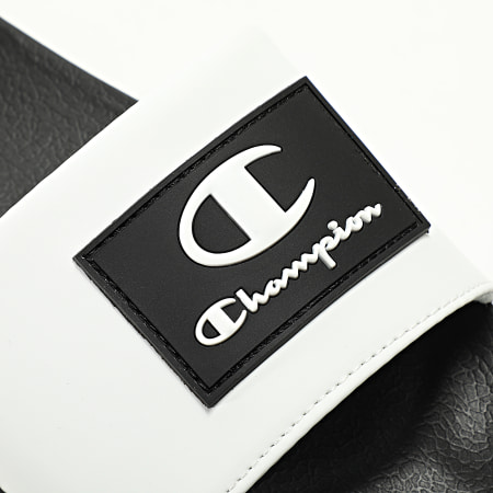 Champion - Claquettes Arubo S22051 Noir Blanc