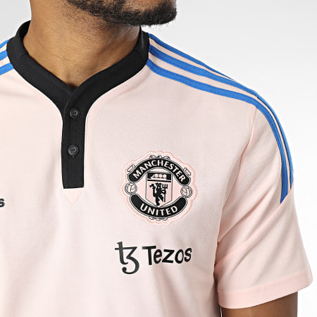 Adidas Sportswear - Polo Manchester United a maniche corte a strisce HT4286 Rosa