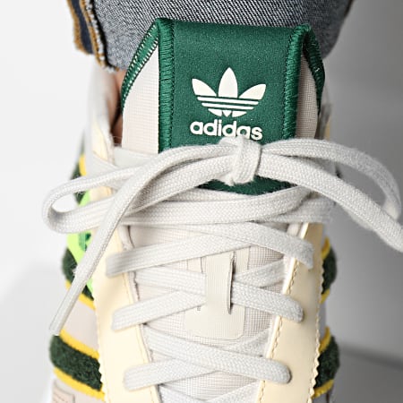 Adidas Originals - Sneaker alte Retropy F2 HQ4360 Aluminium Verde Scuro Giallo Solare