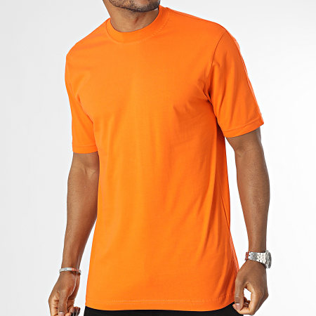 FREE PEOPLE ORANGE OPEN SIDED TEE SIZE M NWT
