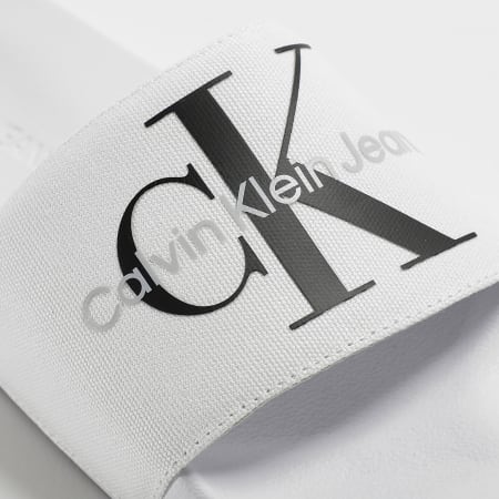 Calvin Klein - Claquettes Slide Monogram 0061 White