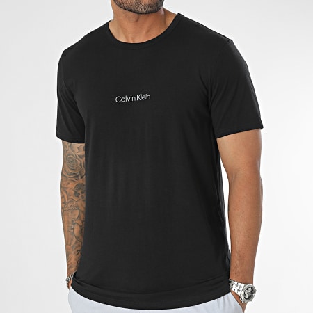 Calvin Klein - Ensemble Tee Shirt Et Short Jogging NM2183E Noir Gris Chiné