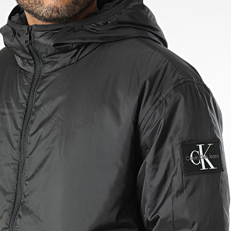 Calvin Klein - Giacca a vento con cappuccio e zip 3462 nero
