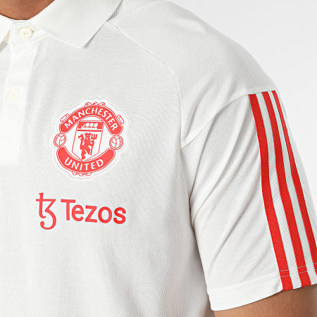 Adidas Sportswear - Polo Manchester United a maniche corte a righe IM0521 Bianco