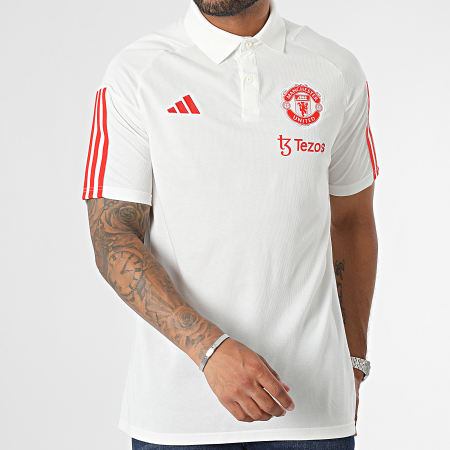Adidas Sportswear - Polo Manchester United a maniche corte a righe IM0521 Bianco