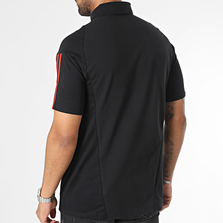 Adidas Sportswear - Polo Manchester United a maniche corte a righe IM0521 Nero