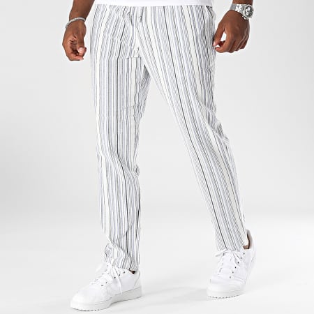 Pantalon blanco new arrivals con rayas azules
