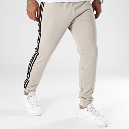 Adidas Originals - Pantalón de chándal con banda IM4544 Beige