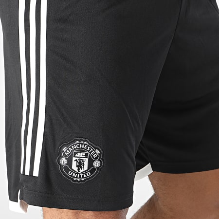 Adidas Sportswear - Pantaloncini da jogging con banda nera del Manchester United HR3683