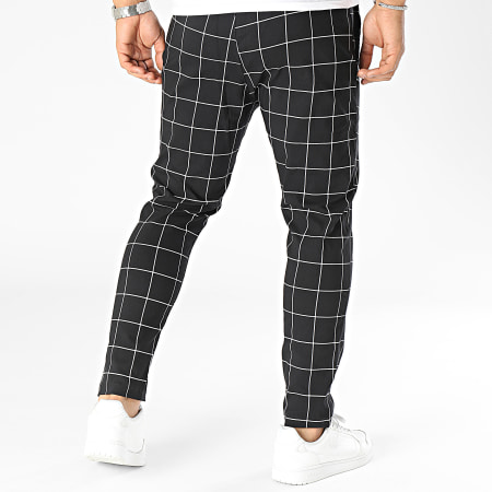 Uniplay - Pantaloni a quadri bianchi e neri