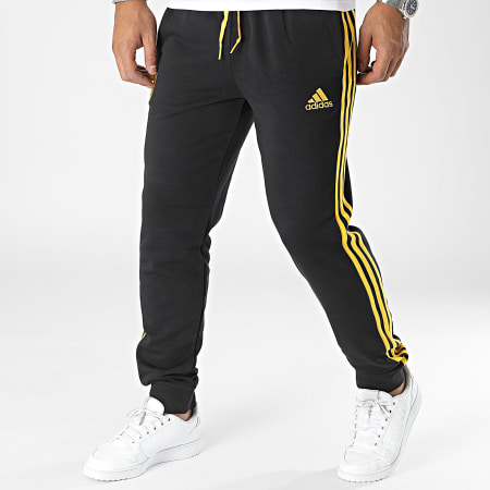 Adidas Sportswear - Juventus HZ4960 Pantaloni da jogging a bande giallo-nere
