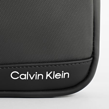 Calvin Klein - Sacoche Rubberized Conv Reporter 1252 Noir