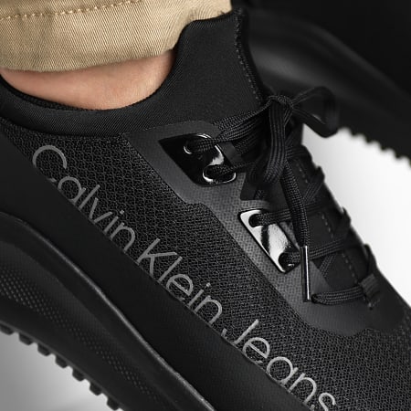 Calvin Klein - Baskets Eva Run Slipon Lace Mix In Lum YM0YM00870 Triple Black